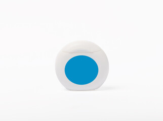 Dental floss isolated on white background.Container with dental floss. dental care. Fresh breath. Prevention of caries. Dentistry concept.