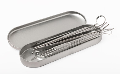 Dental tools isolated on white background.Set of metal tools of medical equipment for dental care. Fresh breath and caries prevention. Dentistry concept. Dental hygiene.