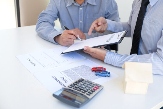 Business people signing contract making a deal with real estate agent Concept for consultant and home insurance concept.