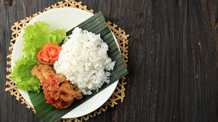  Ayam Penyet. Deep Fried Chicken Served with Sambel or Sambal