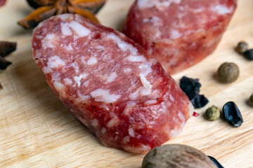 Dried pork sausage during slicing