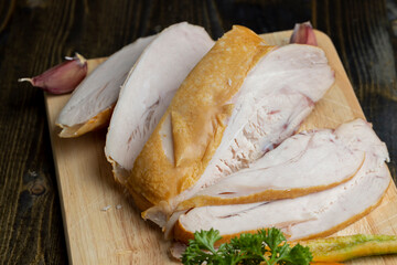 Smoke-smoked chicken on a board