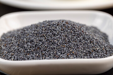 A large number of poppy seeds on the cooking table