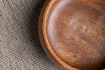 an old empty wooden bowl on the table