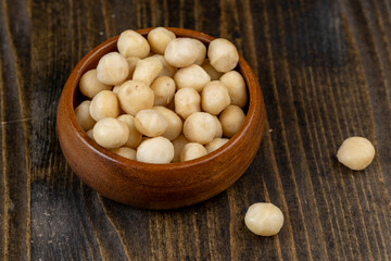 Peeled macadamia nuts on the table