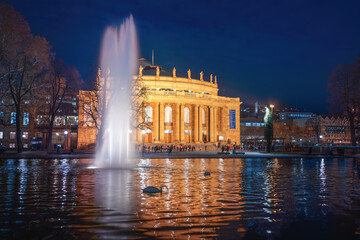 Stuttgart Opera House (Staatstheater) and Eckensee lake at night - Stuttgart, Germany