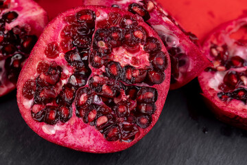 Harvested harvest of red ripe pomegranates