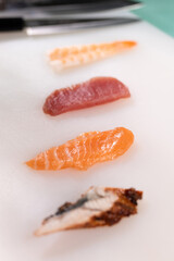 Fresh and Flavorful Nigiri Sushi with Tuna and Salmon
Traditional Nigiri Sushi for Japanese Cuisine Enthusiasts Delicious Nigiri Sushi with Roe and Wasabi for a Perfect Bite
