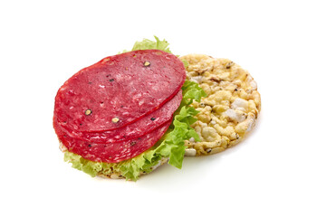 Smoked salchichon sausage, isolated on white background.