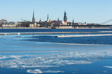Partly ice covered river Daugava in capital Riga