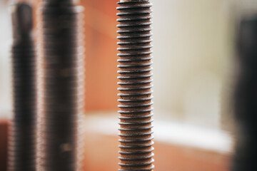 Aged and rust metal thread. Concept of metal oxidation while outdoors. Corrosion and decay of...