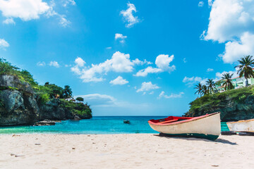 boat in lagun beach, a Secret beach in the caribbean island of curacao, landscape with  Copyspace