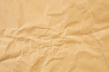 Abstract brown crumpled creased recycle paper texture background