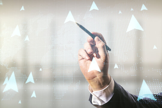 Man Hand With Pen Draws Abstract Virtual GPS Locator Sketch With World Map On Blurred Office Background, Monitoring And Tracking Concept. Multi Exposure