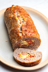 homemade meat loaf filled with egg and sausage