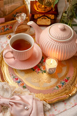 still life with tea candle afternoon tea florentine tray tea pot