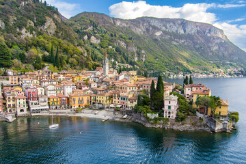 Beautiful aerial waterfront cityscape of Varenna, one of the most picturesque towns on the shore of Lake Como. Charming location with typical Italian atmosphere. Varenna, Italy.