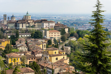 Fototapeta na wymiar Scenic view of Bergamo city northeast of Milan. Citta Alta, town's upper district, known by cobblestone streets and encircled by Venetian walls. Bergamo, Italy.