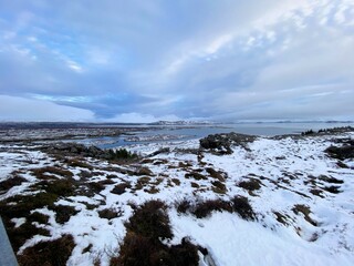 Icelandic landscape with fjord, lake and mountains in winter at Pingvellir National Park