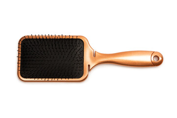 A red hairbrush isolated on a white background. Hair tools.