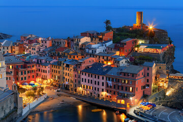 Twiligh view of Picturesque cliff-side village of Vernazza, Cinque Terre, Italy. Famous tourist...
