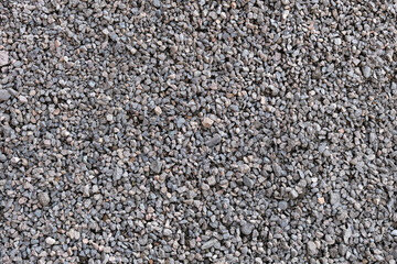 Close-up abstract background of finely crushed stone.