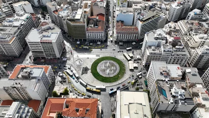Gordijnen Aerial drone photo of famous urban busy round square of Omonia in the heart of Athens historic centre, Attica, Greece © aerial-drone