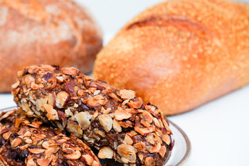 White grain bread and chocolate brownies on white