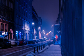 Cyber futuristic color on the street of Warsaw in December at night. 
