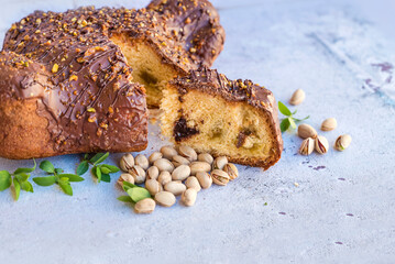 Traditional Italian Easter Dove Bread with chocolate and 
pistachio 