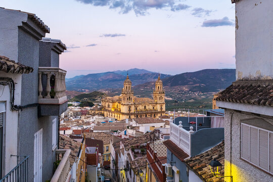 Cityscape of the Andalusian city of Jaen at dusk, with the cathedral to be recognized among the rooftops.