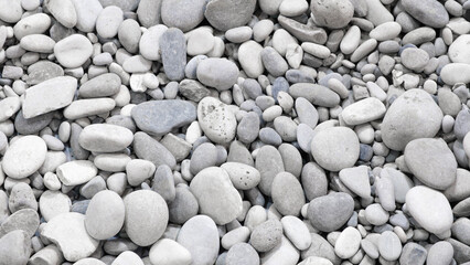 White gray pebble stones texture background