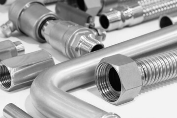 Stainless steel flexible pipes,  close-up mackro. Plumbing fixtures  and piping parts,  Industrial...