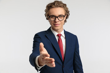 businessman shaking hands in a friendly manner