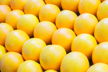 Colorful Display Of Lemons In Fruit Market