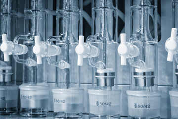 Laboratory research scientific glassware for chemical background. Medical or chemical background with laboratory equipment and liquids.