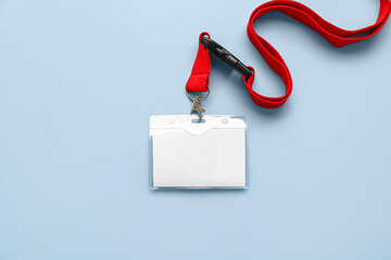 Blank badge with red lanyard on color background