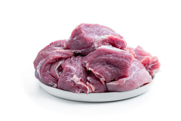 Raw pork meat slices isolated on white background
