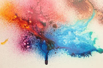 Poster Watercolor flow spray blot drops on beige. Abstract art background. © Liliia