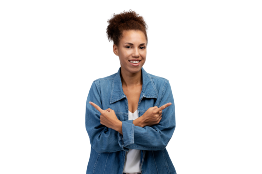 Beautiful smiling African American woman, keeps arms crossed with fingers pointing at copy space isolated on transparent background. Clipping path