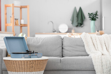 Record player on table in living room