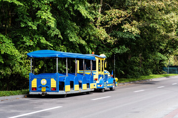 Empty trackless train waiting for tourists for a ride. Sinaia, Romania.