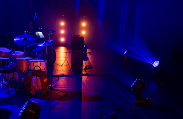 Empty stage with blue concert lighting