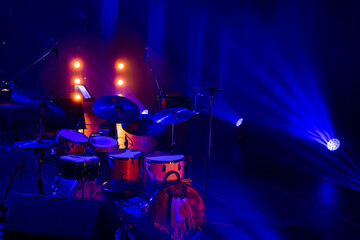 Fototapeta na wymiar Empty stage with blue concert lighting