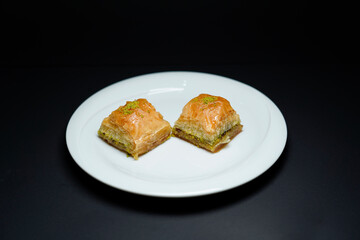 Baklava with Walnuts isolated black background