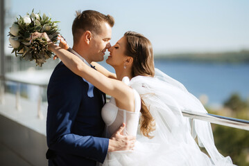 bride and groom first meeting on the roof of skyscraper