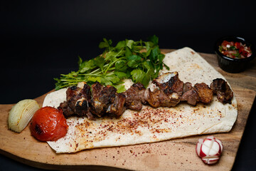 Chopan Kebab Barbecue isolated on black background