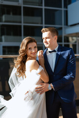 bride and groom first meeting on the roof of skyscraper
