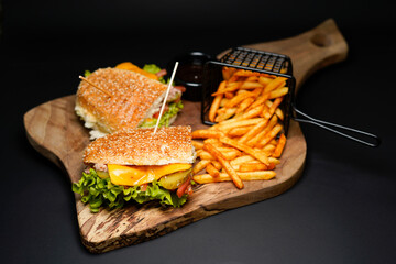 Sandwich with Fries isolated on black background