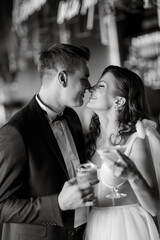 bride and groom inside a cocktail bar